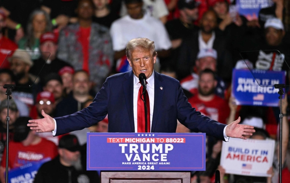 Former U.S. President and Republican presidential candidate Donald Trump speaks during a campaign rally at Huntington Place in Detroit on Friday.  Former U.S. President and Republican presidential candidate Donald Trump speaks during a campaign rally at Huntington Place in Detroit on Friday.