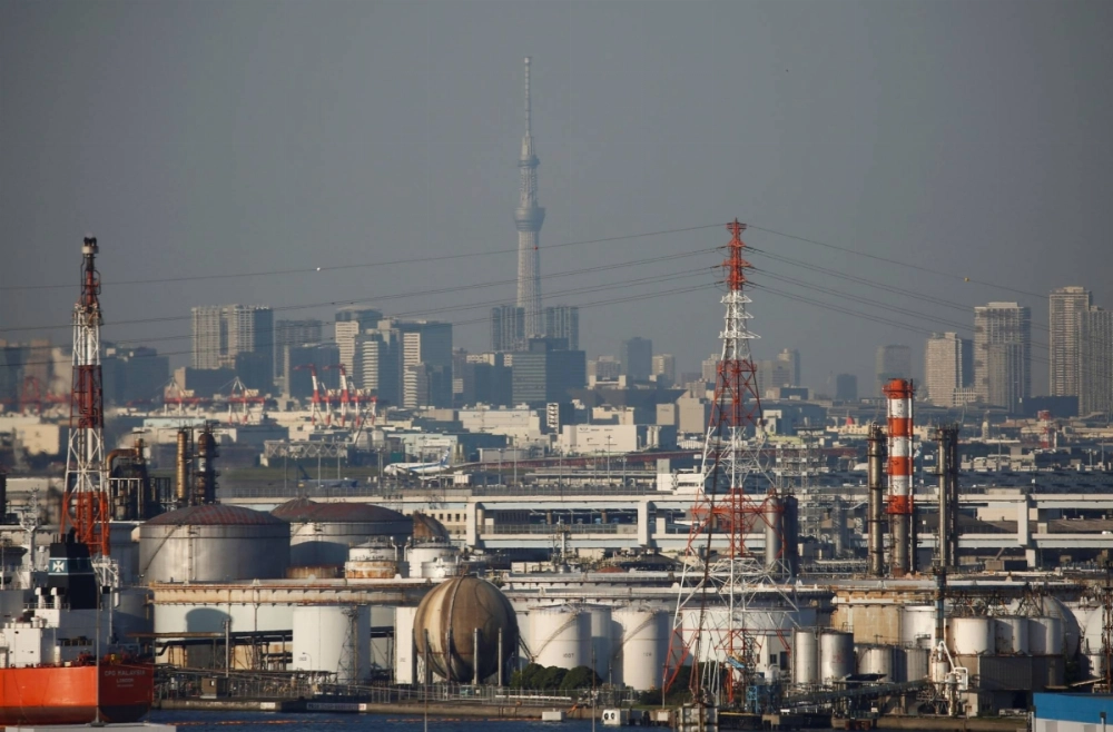 A portion of the Tokyo skyline from an observatory deck at an industrial port in Kawasaki A portion of the Tokyo skyline from an observatory deck at an industrial port in Kawasaki