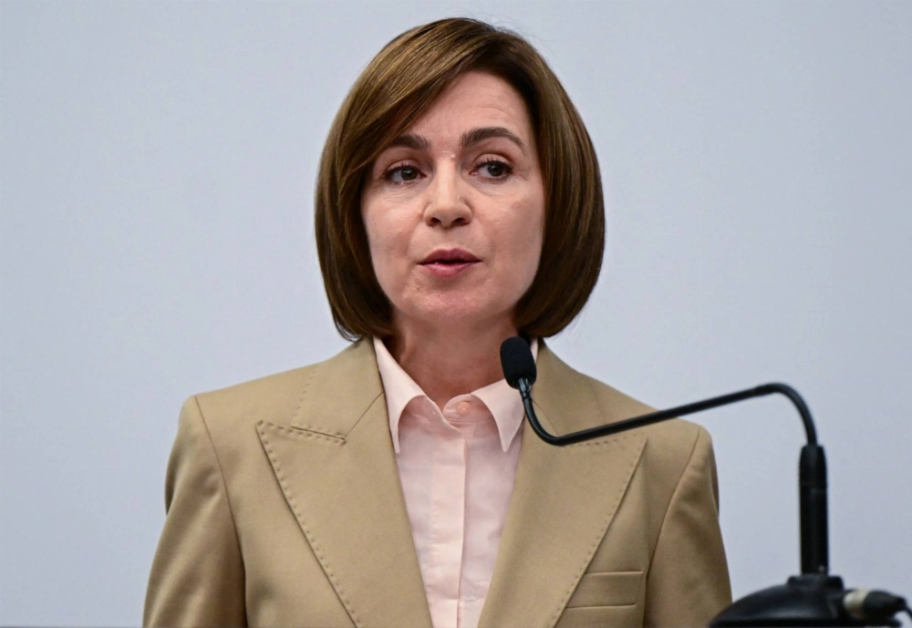 Moldova'n President Maia Sandu attends a press conference at her campaign headquarters in Chisinau on Monday. Moldova'n President Maia Sandu attends a press conference at her campaign headquarters in Chisinau on Monday.