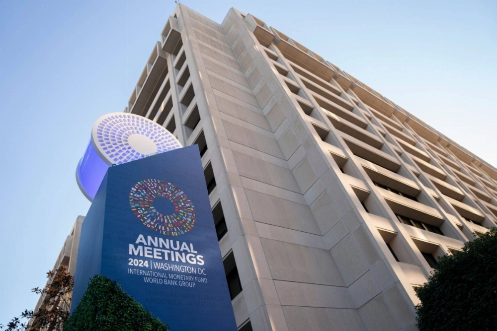 International Monetary Fund (IMF) and World Bank Fall meetings signage outside the IMF headquarters in Washington on Sunday International Monetary Fund (IMF) and World Bank Fall meetings signage outside the IMF headquarters in Washington on Sunday