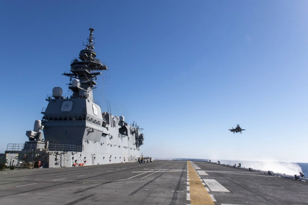 An F-35B stealth fighter jet lands on the Maritime Self-Defense Force's Kaga helicopter carrier during a test on Sunday of the southern coast of California. An F-35B stealth fighter jet lands on the Maritime Self-Defense Force's Kaga helicopter carrier during a test on Sunday of the southern coast of California.