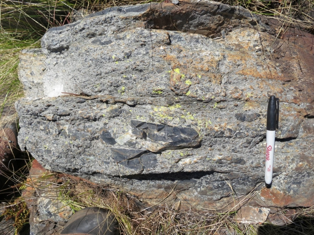 A bed of rock shows chunks of ripped-up seafloor as debris from a tsunami that followed a huge meteorite impact on Earth dating back to about 3.26 billion years ago, seen in a region called the Barberton Greenstone Belt in northeastern South Africa in this undated photograph. A bed of rock shows chunks of ripped-up seafloor as debris from a tsunami that followed a huge meteorite impact on Earth dating back to about 3.26 billion years ago, seen in a region called the Barberton Greenstone Belt in northeastern South Africa in this undated photograph.