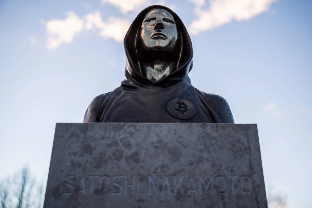 A sculpture representing Satoshi Nakamoto, the pseudonymous creator of Bitcoin, located on the grounds of a park in Budapest A sculpture representing Satoshi Nakamoto, the pseudonymous creator of Bitcoin, located on the grounds of a park in Budapest