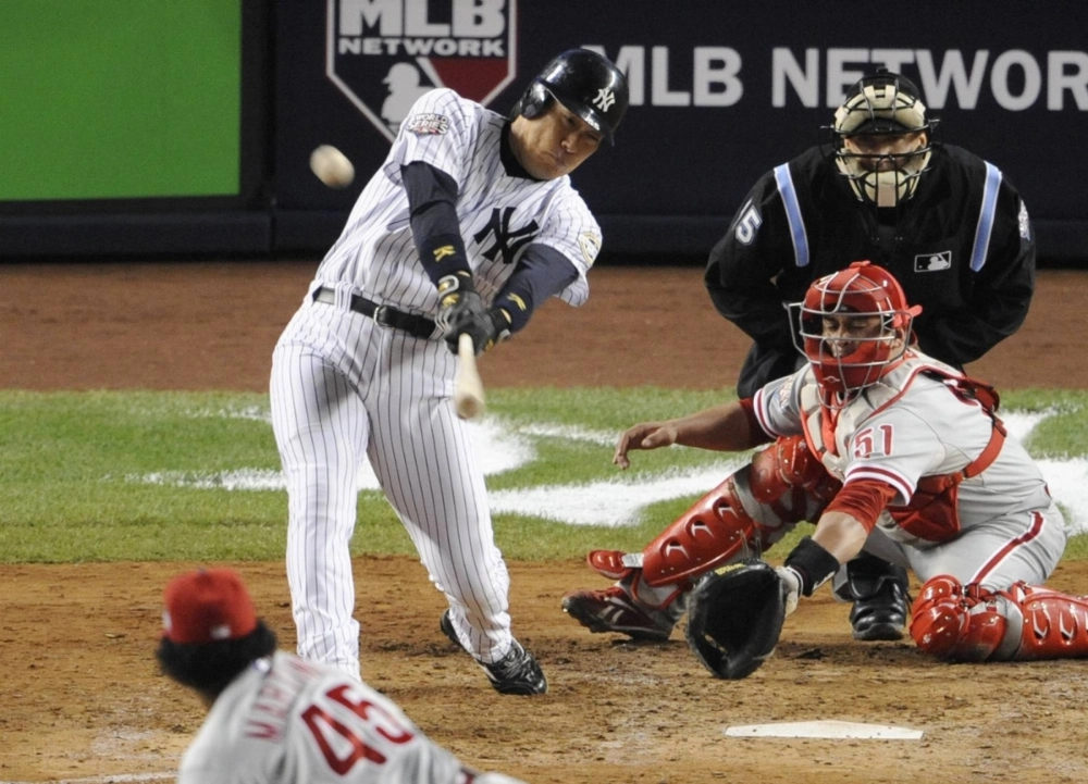 Yankees slugger Hideki Matsui hits a solo home run off Pedro Martinez of the Phillies in Game 2 of the World Series on Oct. 29, 2009.  Yankees slugger Hideki Matsui hits a solo home run off Pedro Martinez of the Phillies in Game 2 of the World Series on Oct. 29, 2009.