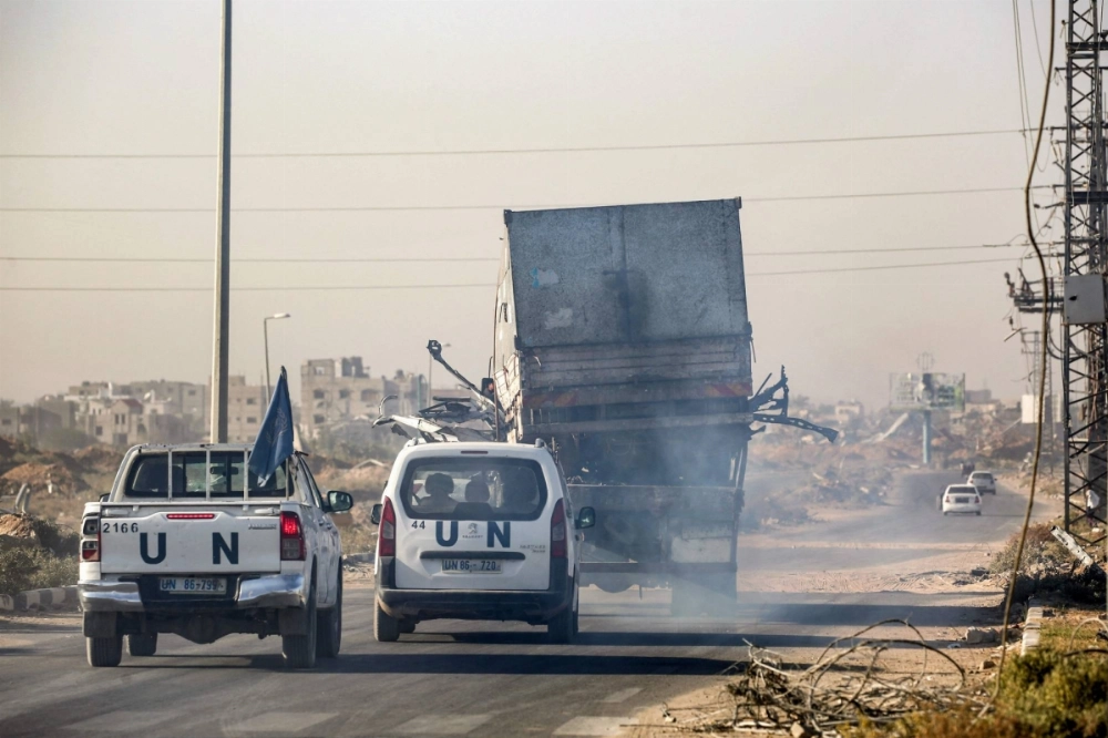 United Nations' vehicles escort a damaged truck that was reportedly used by workers of the U.N. Relief and Works Agency for Palestine Refugees in the Near East, in Gaza last week. United Nations' vehicles escort a damaged truck that was reportedly used by workers of the U.N. Relief and Works Agency for Palestine Refugees in the Near East, in Gaza last week.