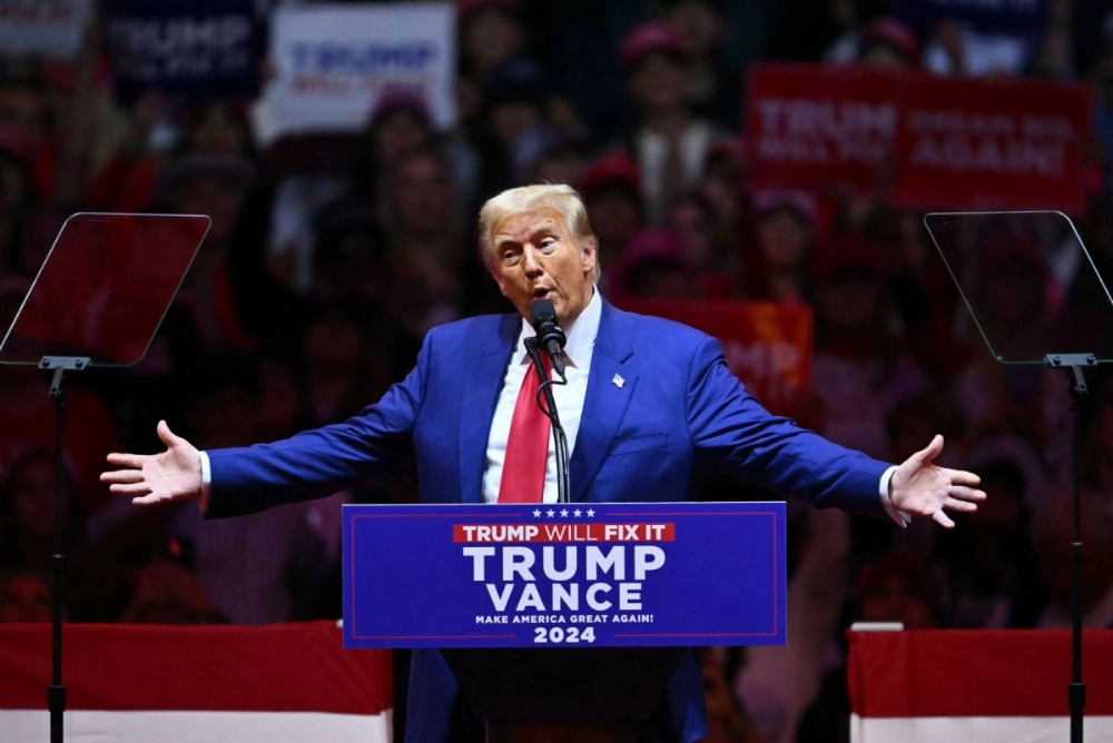 Former U.S. President and Republican presidential candidate Donald Trump gestures as he speaks during a campaign rally at the Madison Square Garden in New York on Sunday. Former U.S. President and Republican presidential candidate Donald Trump gestures as he speaks during a campaign rally at the Madison Square Garden in New York on Sunday.
