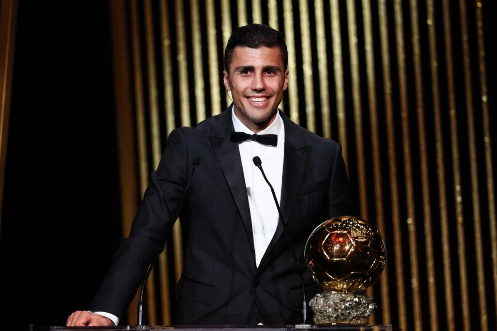 Manchester City midfielder Rodri receives the Ballon d'Or award in Paris on Monday. Manchester City midfielder Rodri receives the Ballon d'Or award in Paris on Monday.