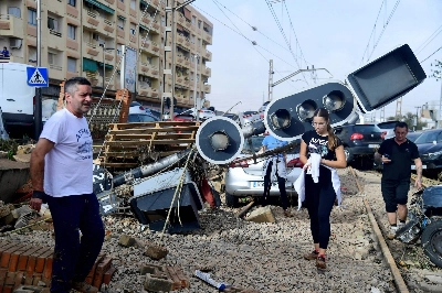 Residents walk past wreckage following deadly floods in Sedavi, south of Valencia, eastern Spain, on Wednesday. Residents walk past wreckage following deadly floods in Sedavi, south of Valencia, eastern Spain, on Wednesday.