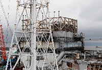 The top of the damaged No.1 reactor building at the Fukushima No. 1 nuclear power plant | Reuters