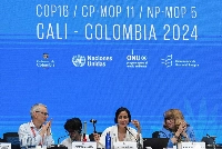 David Cooper (left), executive secretary of COP16, Colombian Environment Minister and COP16 President Susana Muhamad (center), and Astrid Schomaker, secretary of COP16, attend the closing session of the conference in Cali, Colombia, on Saturday. | AFP-JIJI