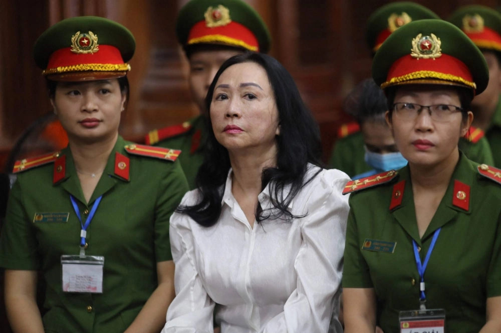 Vietnamese property tycoon Truong My Lan (center) looks on at a court during her fraud case in Ho Chi Minh City on April 11. Vietnamese property tycoon Truong My Lan (center) looks on at a court during her fraud case in Ho Chi Minh City on April 11.