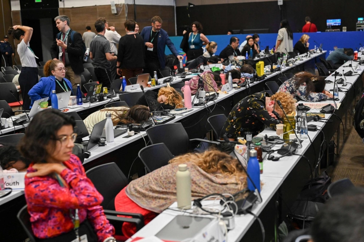 Delegates attend the last plenary session of the COP16 Summit in Cali, Colombia, on Friday. Delegates attend the last plenary session of the COP16 Summit in Cali, Colombia, on Friday.