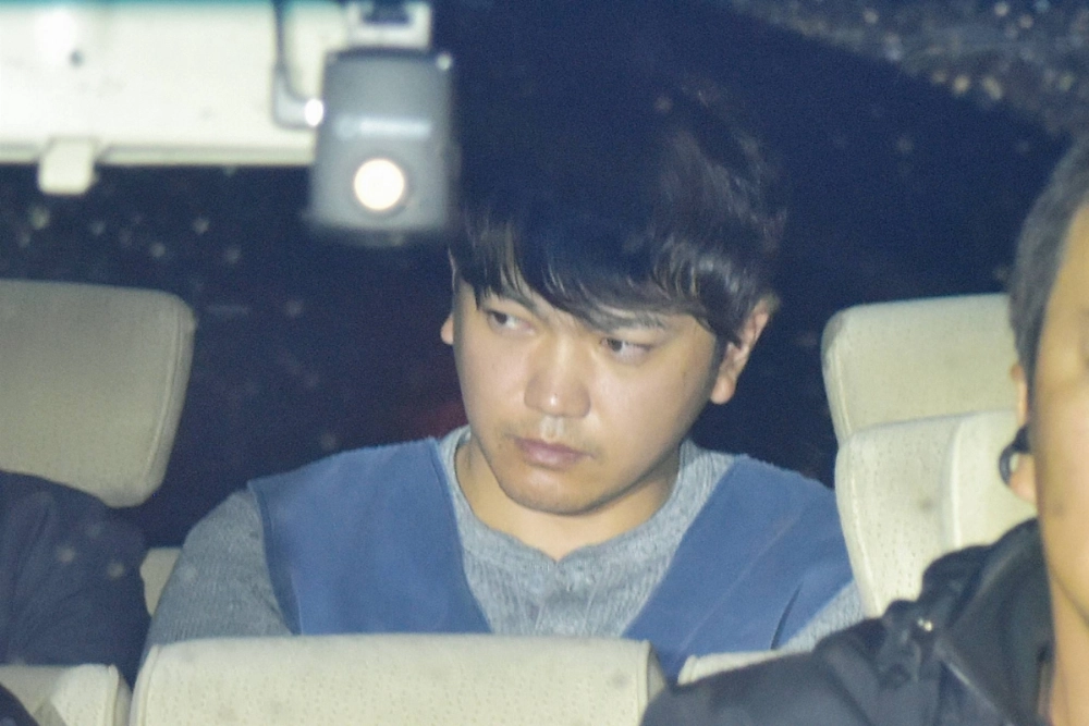 Yuya Nagura is taken to the Tokorozawa Police Station in Tokorozawa, Saitama Prefecture, on Saturday after being arrested on suspicion of recruiting people to rob a house in the city. Yuya Nagura is taken to the Tokorozawa Police Station in Tokorozawa, Saitama Prefecture, on Saturday after being arrested on suspicion of recruiting people to rob a house in the city.