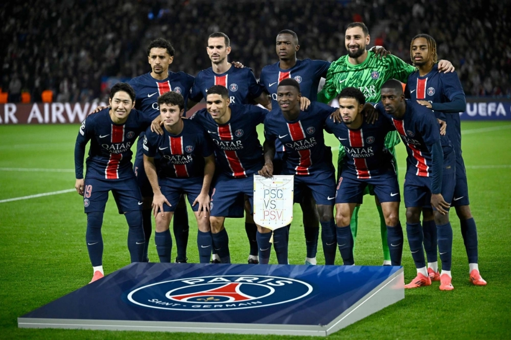 Paris Saint-Germain players pose for a group picture prior to the start of a UEFA Champions League match against PSV Eindhoven in Paris on Oct. 22. Paris Saint-Germain players pose for a group picture prior to the start of a UEFA Champions League match against PSV Eindhoven in Paris on Oct. 22.