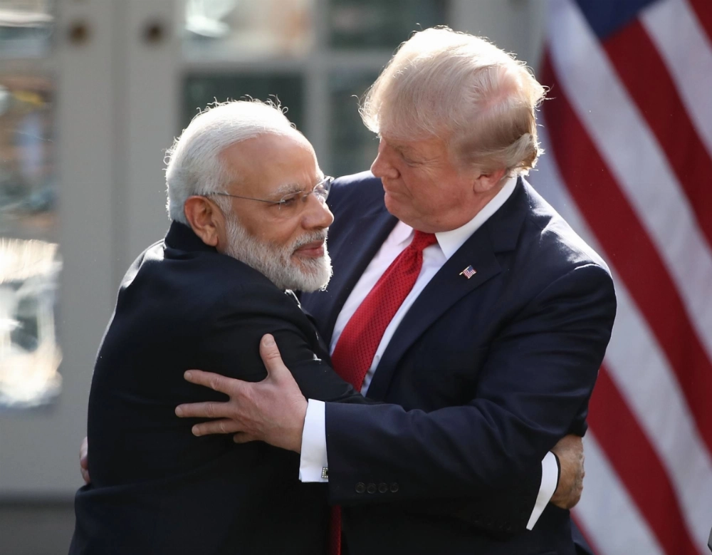 Then-U.S. President Donald Trump and Indian Prime Minister Narendra Modi embrace at the White House in 2017. Then-U.S. President Donald Trump and Indian Prime Minister Narendra Modi embrace at the White House in 2017.