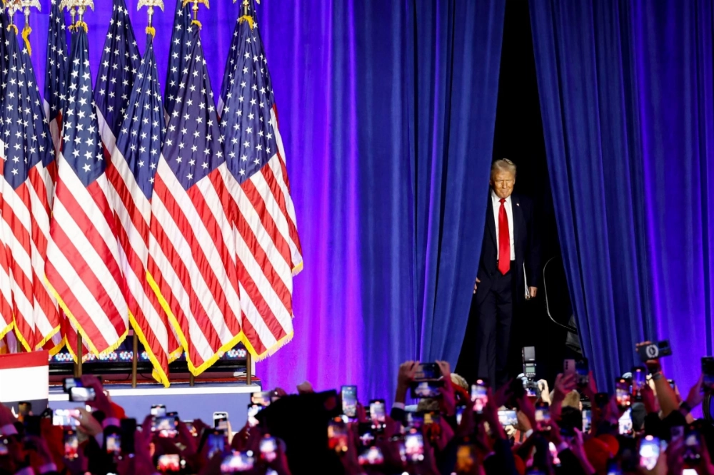 Donald Trump arrives for an election night event at the Palm Beach Convention Center in West Palm Beach, Florida, on Wednesday.  Donald Trump arrives for an election night event at the Palm Beach Convention Center in West Palm Beach, Florida, on Wednesday.