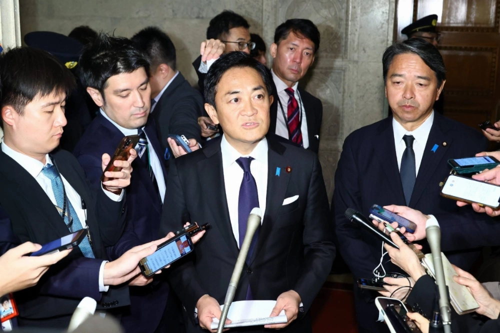 DPP leader Yuichiro Tamaki speaks to reporters on Monday at parliament. DPP leader Yuichiro Tamaki speaks to reporters on Monday at parliament.