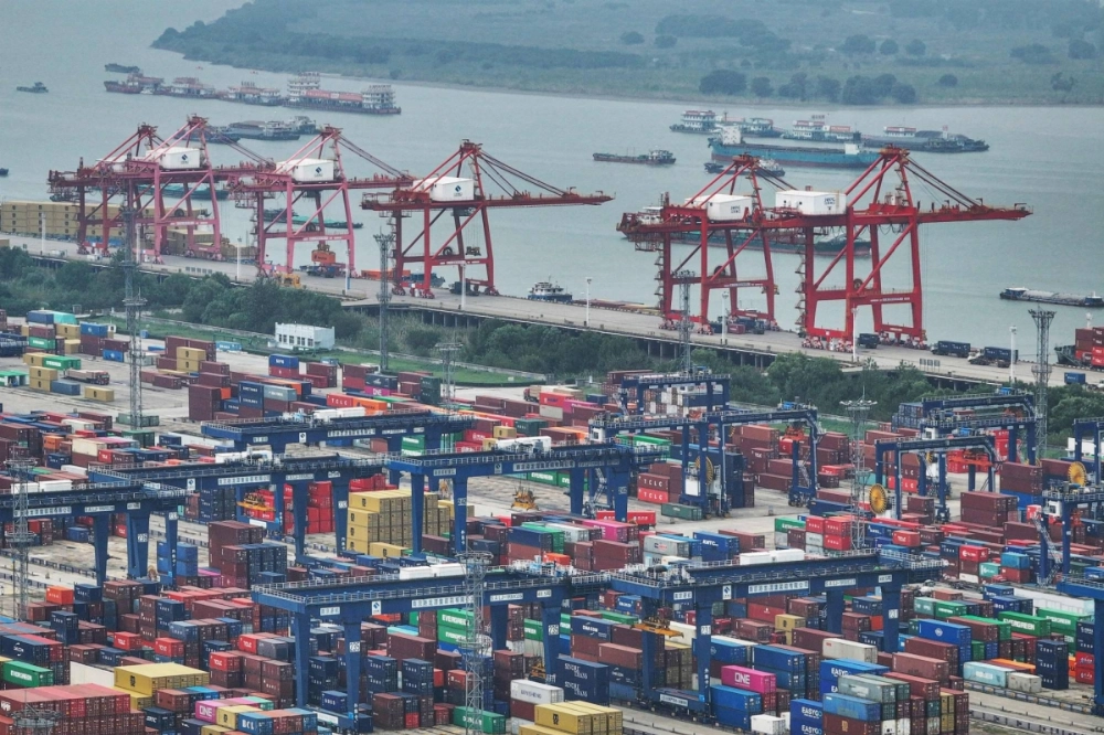 Shipping containers are seen at the Port of Nanjing in eastern China's Jiangsu province on Oct. 17. Shipping containers are seen at the Port of Nanjing in eastern China's Jiangsu province on Oct. 17.
