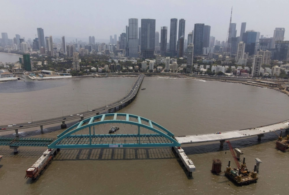 An infrastructure project in the city of Mumbai. The International Monetary Fund forecasts 7.0% growth for India in 2024 and 6.5% in 2025, compared with 0.3% growth for Japan this year and 1.1% next year. An infrastructure project in the city of Mumbai. The International Monetary Fund forecasts 7.0% growth for India in 2024 and 6.5% in 2025, compared with 0.3% growth for Japan this year and 1.1% next year.
