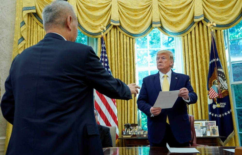 Then-Chinese Vice Premier Liu He presents a letter from his boss, Xi Jinping, to then-U.S. President Donald Trump at the White House following trade negotiations in October 2019.
 Then-Chinese Vice Premier Liu He presents a letter from his boss, Xi Jinping, to then-U.S. President Donald Trump at the White House following trade negotiations in October 2019.