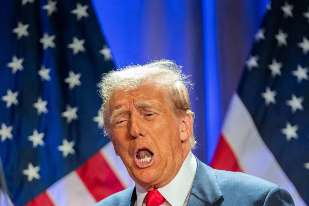 U.S. President-elect Donald Trump attends a meeting with House Republicans at the Hyatt Regency hotel in Washington on Wednesday. U.S. President-elect Donald Trump attends a meeting with House Republicans at the Hyatt Regency hotel in Washington on Wednesday.