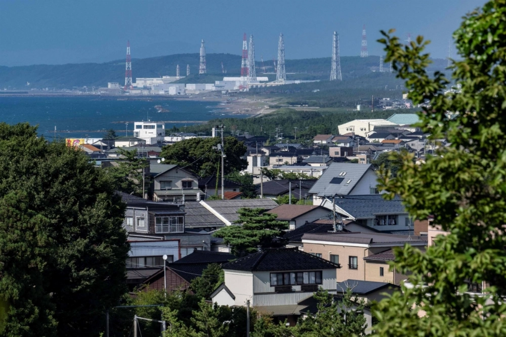 The Kashiwazaki-Kariwa nuclear power station in Niigata Prefecture, the world's biggest nuclear plant, on Aug. 5. Like many others in Japan, the plant is seeking clearance to restart, as the country grapples with how to shape its nuclear future. The Kashiwazaki-Kariwa nuclear power station in Niigata Prefecture, the world's biggest nuclear plant, on Aug. 5. Like many others in Japan, the plant is seeking clearance to restart, as the country grapples with how to shape its nuclear future.
