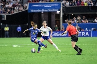 United States midfielder Sam Coffey (17) battles Japan forward Yui Hasegawa (14) during the SheBelieves Cup in Atlanta in April.  | USA Today / via Reuters