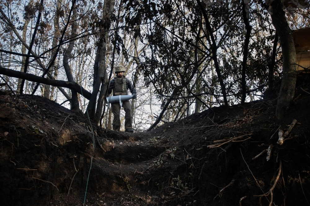 A Ukrainian soldier carries a shell to a field gun being fired at the advancing Russian Army, in the Donetsk Oblast on Nov. 16. As the war in Ukraine enters its fourth winter, a decision by the Biden administration now allows U.S. long-range missile strikes inside Russia. A Ukrainian soldier carries a shell to a field gun being fired at the advancing Russian Army, in the Donetsk Oblast on Nov. 16. As the war in Ukraine enters its fourth winter, a decision by the Biden administration now allows U.S. long-range missile strikes inside Russia.