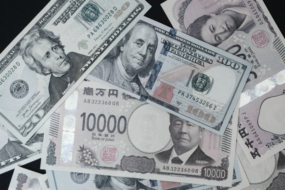 The yen briefly breached the key ¥150 mark against the dollar on Friday, as traders' expectations for a rate hike by the Bank of Japan in December grow. The yen briefly breached the key ¥150 mark against the dollar on Friday, as traders' expectations for a rate hike by the Bank of Japan in December grow.