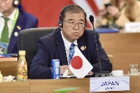 Prime Minister Shigeru Ishiba attends a meeting during the Group of 20 leaders' summit in Rio de Janeiro on Nov. 18. | BRAZILIAN PRESIDENCY / VIA AFP-JIJI