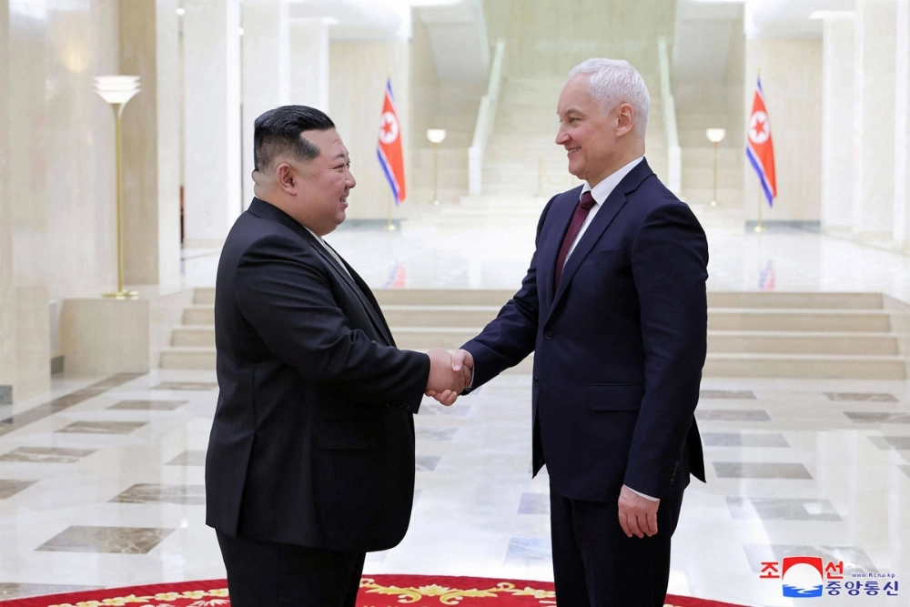 North Korean leader Kim Jong Un meets with Russian Defense Minister Andrei Belousov in Pyongyang in this image released Saturday.   North Korean leader Kim Jong Un meets with Russian Defense Minister Andrei Belousov in Pyongyang in this image released Saturday.
