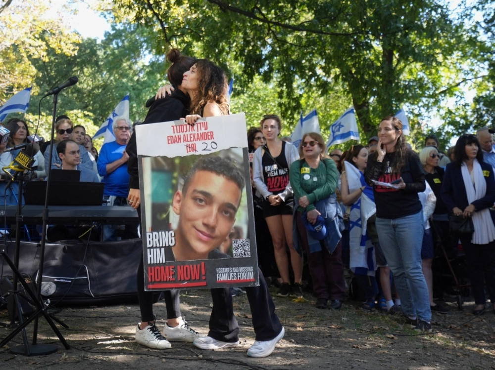 The mother of Israeli hostage Edan Alexander (L) hugs an organizer at a pro-Israel rally in New York on Oct. 6. The mother of Israeli hostage Edan Alexander (L) hugs an organizer at a pro-Israel rally in New York on Oct. 6.