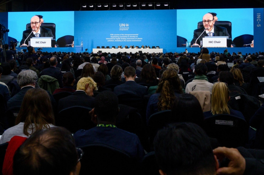 INC-5 Chair Luis Vayas Valdivieso (on screen) speaks during an open plenary session during the fifth session of the U.N. Intergovernmental Negotiating Committee on Plastic Pollution (INC-5) in Busan, South Korea, on Sunday. INC-5 Chair Luis Vayas Valdivieso (on screen) speaks during an open plenary session during the fifth session of the U.N. Intergovernmental Negotiating Committee on Plastic Pollution (INC-5) in Busan, South Korea, on Sunday.