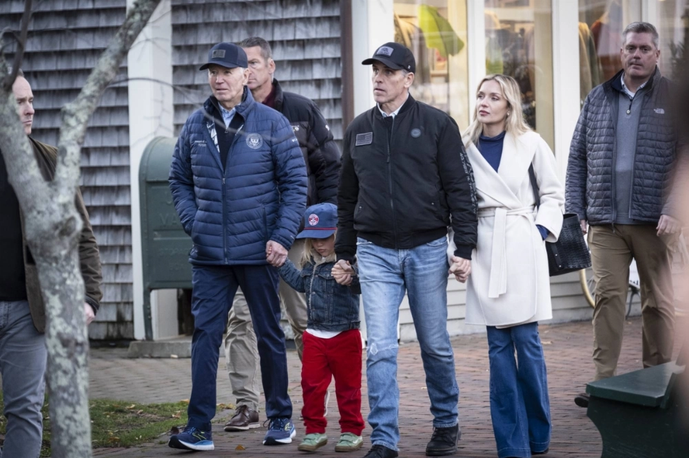 President Joe Biden walks with his son Hunter and his family through Nantucket, Massachusetts, on Friday. President Joe Biden walks with his son Hunter and his family through Nantucket, Massachusetts, on Friday.