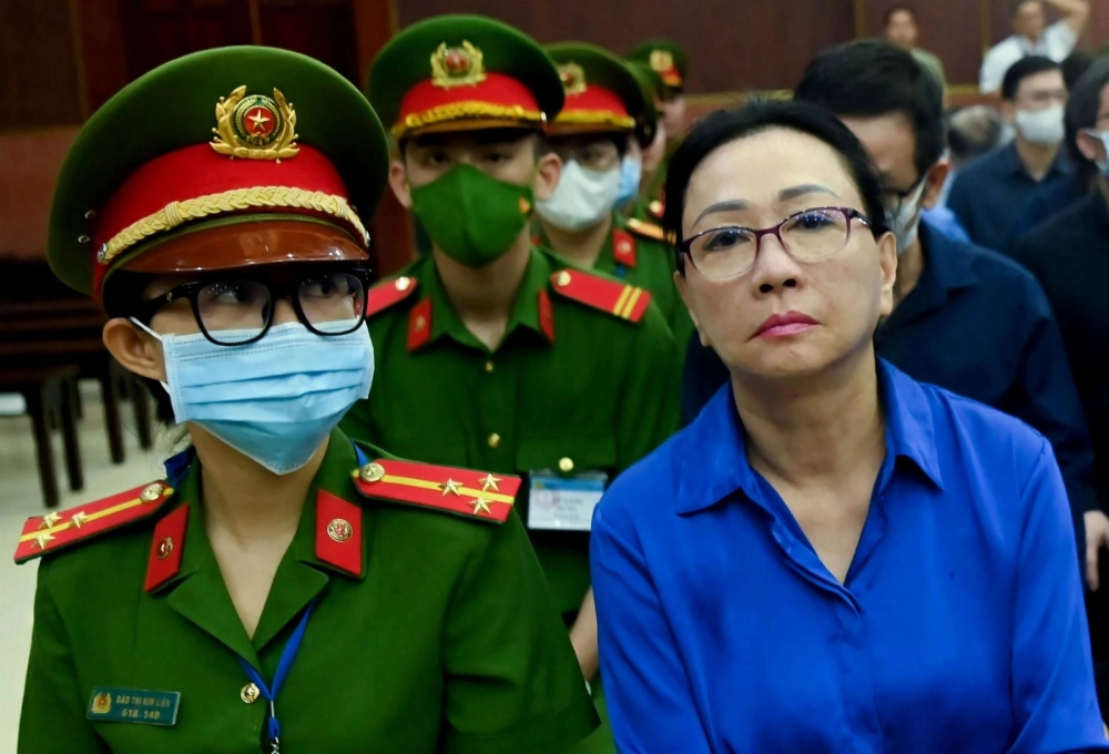 Vietnamese property tycoon Truong My Lan (right) looks on at a court in Ho Chi Minh city on Tuesday. Vietnamese property tycoon Truong My Lan (right) looks on at a court in Ho Chi Minh city on Tuesday.