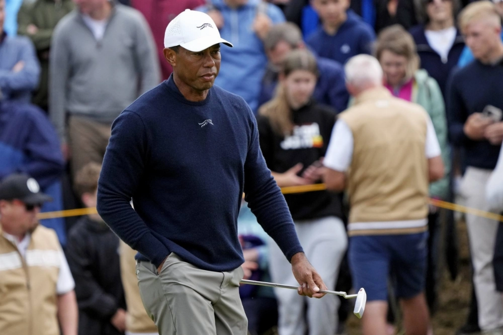 Tiger Woods competes at the British Open in July. Tiger Woods competes at the British Open in July.