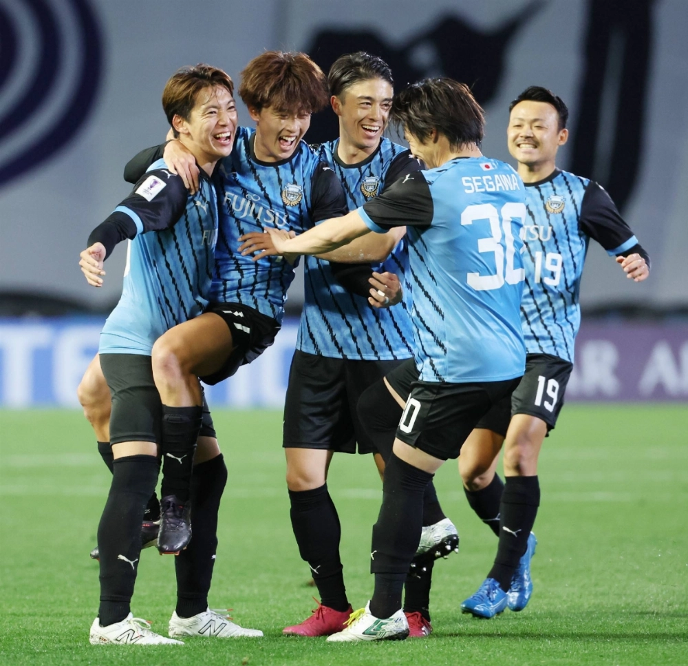 Kawasaki players celebrate after Yuki Yamamoto (second from left) scroed the team's second goal during the first half of Wednesday's Asian Champions League home win over Shandong.  Kawasaki players celebrate after Yuki Yamamoto (second from left) scroed the team's second goal during the first half of Wednesday's Asian Champions League home win over Shandong.