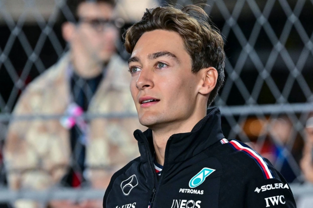 British driver George Russell arrives to participate in the drivers' parade ahead of the Qatari Formula One Grand Prix at the Lusail International Circuit in Lusail, north of Doha, on Dec. 1.  British driver George Russell arrives to participate in the drivers' parade ahead of the Qatari Formula One Grand Prix at the Lusail International Circuit in Lusail, north of Doha, on Dec. 1.
