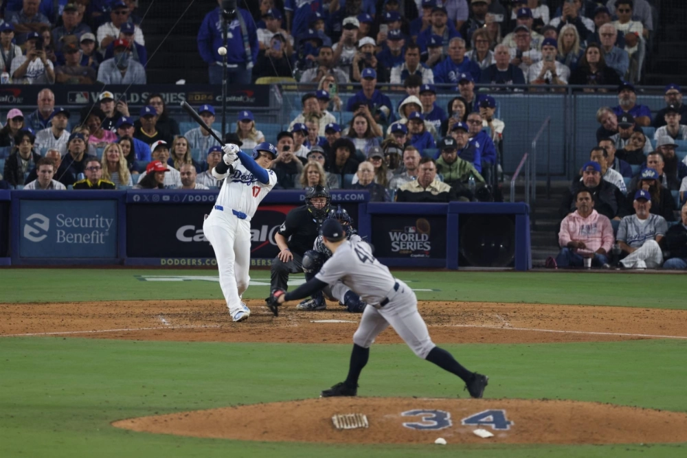 Dodgers star Shohei Ohtani gets a hit during Game 1 of the World Series on Oct. 25. The Golden At-Bat is an idea that would change everything about how baseball — the ultimate team sport — has always worked.
 Dodgers star Shohei Ohtani gets a hit during Game 1 of the World Series on Oct. 25. The Golden At-Bat is an idea that would change everything about how baseball — the ultimate team sport — has always worked.