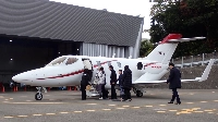 Shareholders board a HondaJet for a sightseeing flight at Oita Airport in Kunisaki, Oita Prefecture, on Saturday. | Jiji