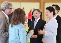 Emperor Naruhito and Empress Masako speak with winners of the Praemium Imperiale at the Imperial Palace on Nov. 20. The imperial couple will attend a memorial ceremony to mark the 30th anniversary of the 1995 Great Hanshin Earthquake in January. | Jiji