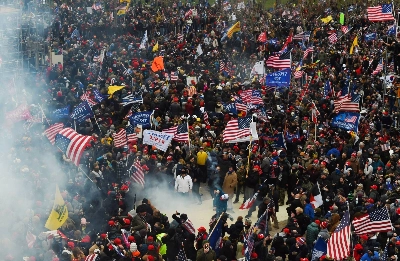 Supporters of then-President Donald Trump clash with police while storming the U.S. Capitol on Jan. 6, 2021. Supporters of then-President Donald Trump clash with police while storming the U.S. Capitol on Jan. 6, 2021.