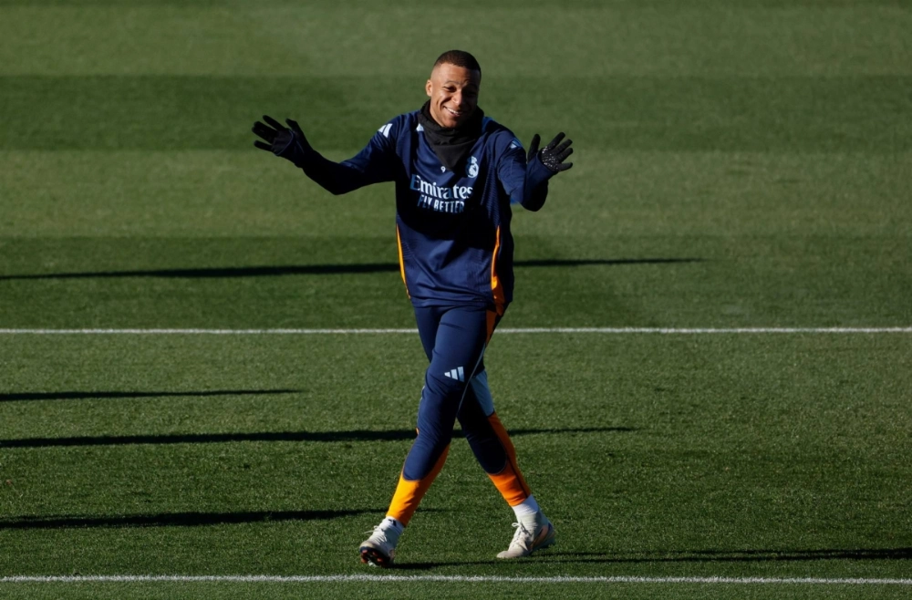 Real Madrid's Kylian Mbappe attends a training session on Saturday near Madrid.  Real Madrid's Kylian Mbappe attends a training session on Saturday near Madrid.