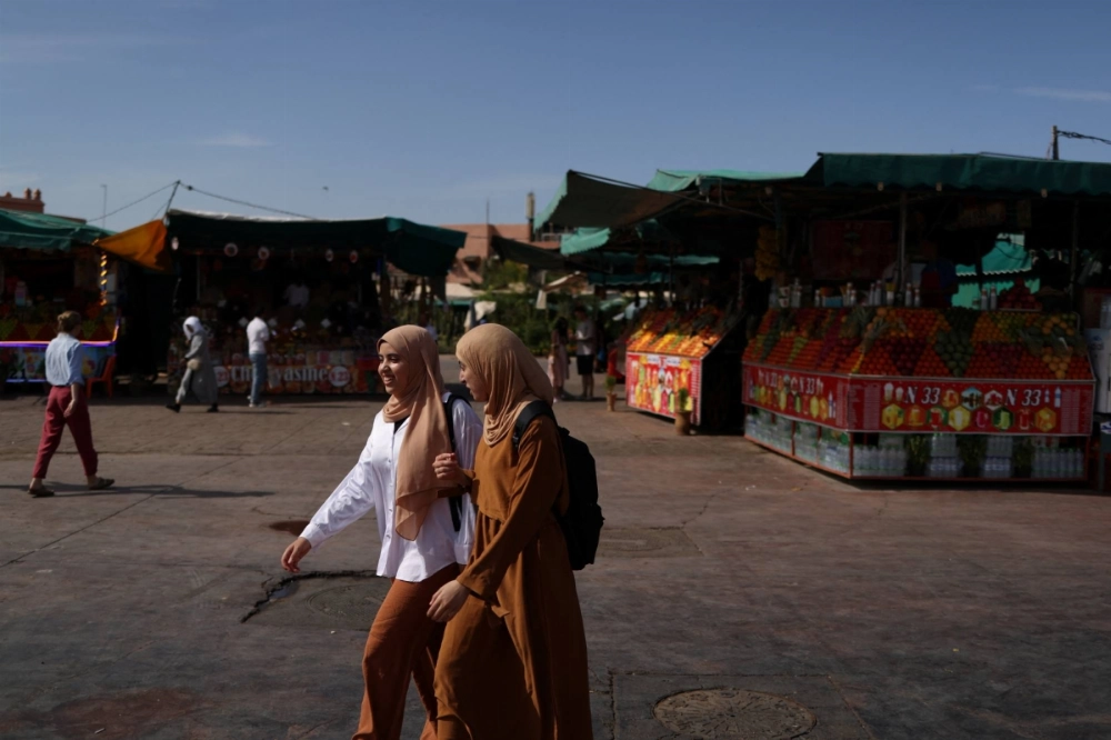 People walk past Jemaa el-Fnaa square, in Marrakesh, Morocco, on Oct. 22. People walk past Jemaa el-Fnaa square, in Marrakesh, Morocco, on Oct. 22.