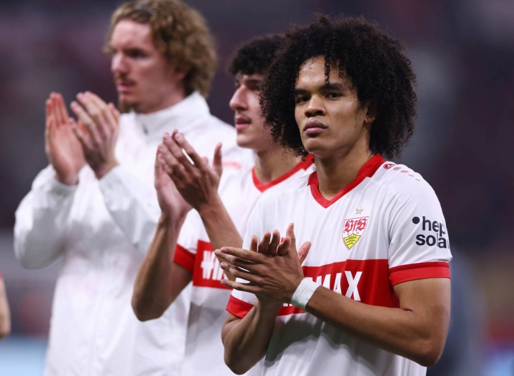 Stuttgart's Anrie Chase applauds the fans after a match against Bayer Leverkusen on Nov. 1.  Stuttgart's Anrie Chase applauds the fans after a match against Bayer Leverkusen on Nov. 1.