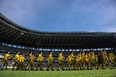 High school soccer teams during the opening ceremony for the national championships on Saturday at National Stadium in Tokyo.  High school soccer teams during the opening ceremony for the national championships on Saturday at National Stadium in Tokyo.