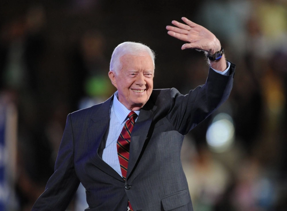 Former President Jimmy Carter waves to the crowd at the Democratic National Convention 2008  Former President Jimmy Carter waves to the crowd at the Democratic National Convention 2008