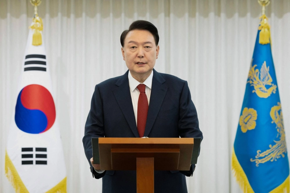 South Korean President Yoon Suk Yeol gives a public address from his official residence in Seoul on Dec. 14.  South Korean President Yoon Suk Yeol gives a public address from his official residence in Seoul on Dec. 14.