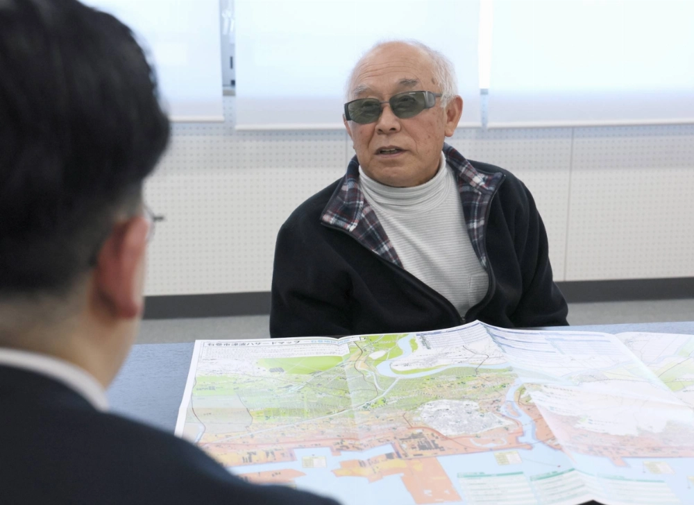 Kenichi Tatsumi, 74, chairman of an association for people with visual impairment in the city of Ishinomaki in Miyagi Prefecture, speaks during an interview in November.  Kenichi Tatsumi, 74, chairman of an association for people with visual impairment in the city of Ishinomaki in Miyagi Prefecture, speaks during an interview in November.