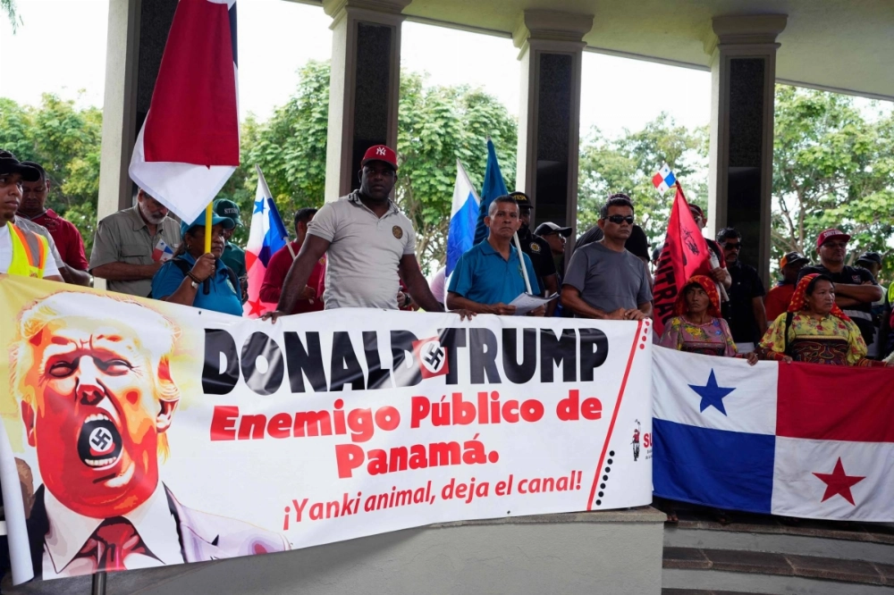 People demonstrate against U.S. President-elect Donald Trump in Panama City on Tuesday as the country marks the 25th anniversary of the United States' handover of the interoceanic Panama Canal. People demonstrate against U.S. President-elect Donald Trump in Panama City on Tuesday as the country marks the 25th anniversary of the United States' handover of the interoceanic Panama Canal.